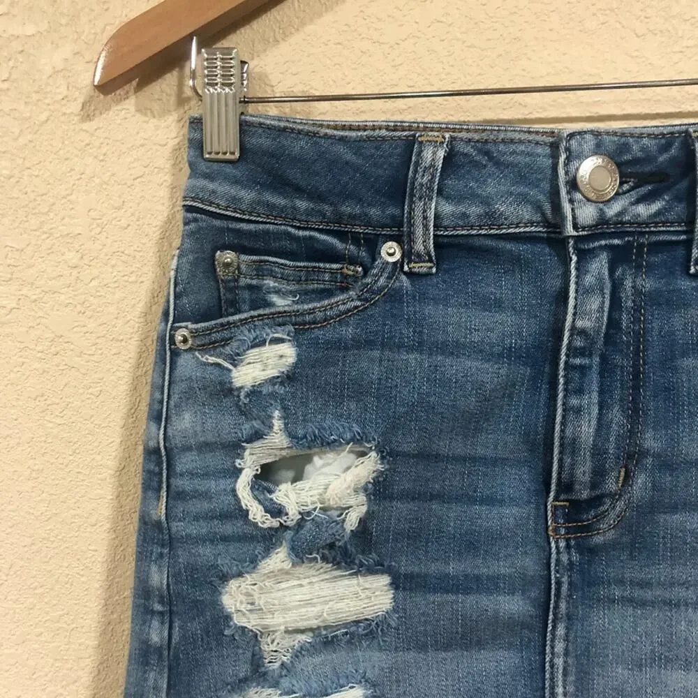 American Eagle Outfitters AEO distressed medium blue wash high rise mini skirt